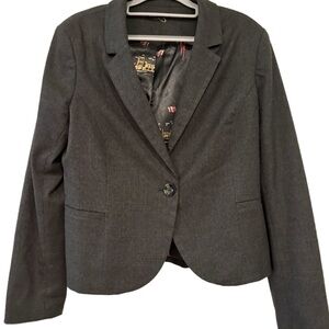 Black Tailored Blazer with Notched Lapels and Suede Elbow Patches.